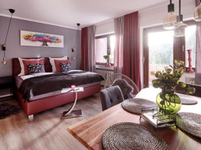 KATARINAS HOUSE mit 2 FeWo stilvoll, gemütlich & zentral Boxspringbett, Parkplatz, Balkon oder Garten